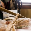 On the ferry back to his home in Staten Island, Kocher demonstrates how he makes his bubbling gear. By attaching a large loop of yarn to the bamboo sticks with nonabsorbent string, he is able to make bubbles big enough for a person to fit inside.